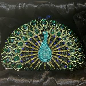 Brand new Crystal Peacock Cluth